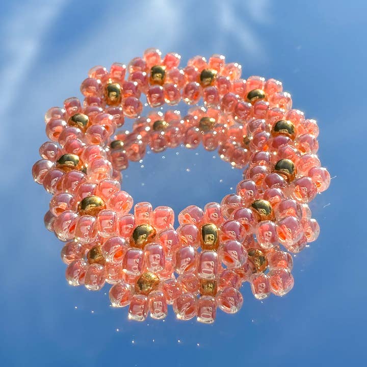 Anel de flores "Lilly" de missangas em damasco por atacado de cool people club