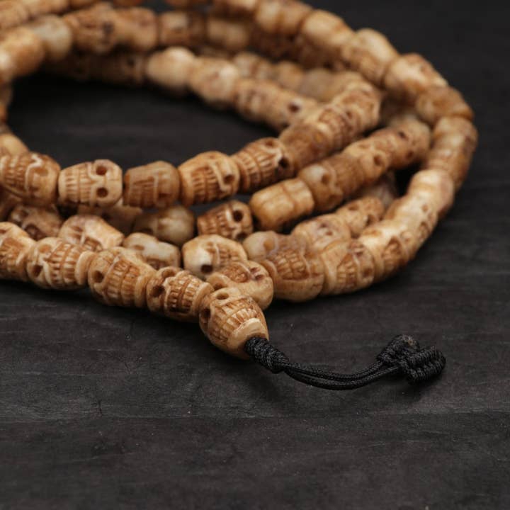 Nairu - A Wellness Boutique - Wholesale Prayer Beads Necklace - Eternal Cycle: Calming Skull Yak Bone Mala1