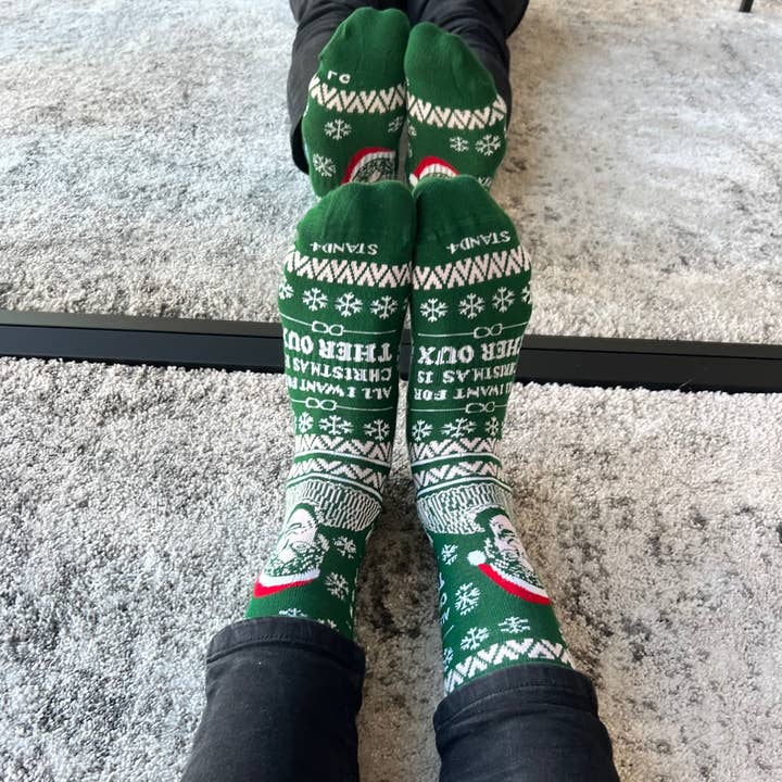 Green All I want for Christmas is Louis Theroux Sock for wholesale on Faire
