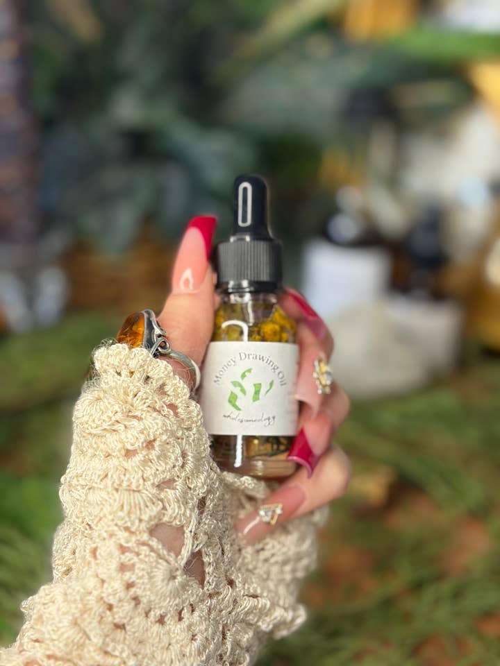 Huile d'onction "L'argent vient à moi" pour la vente par Wholesomeology