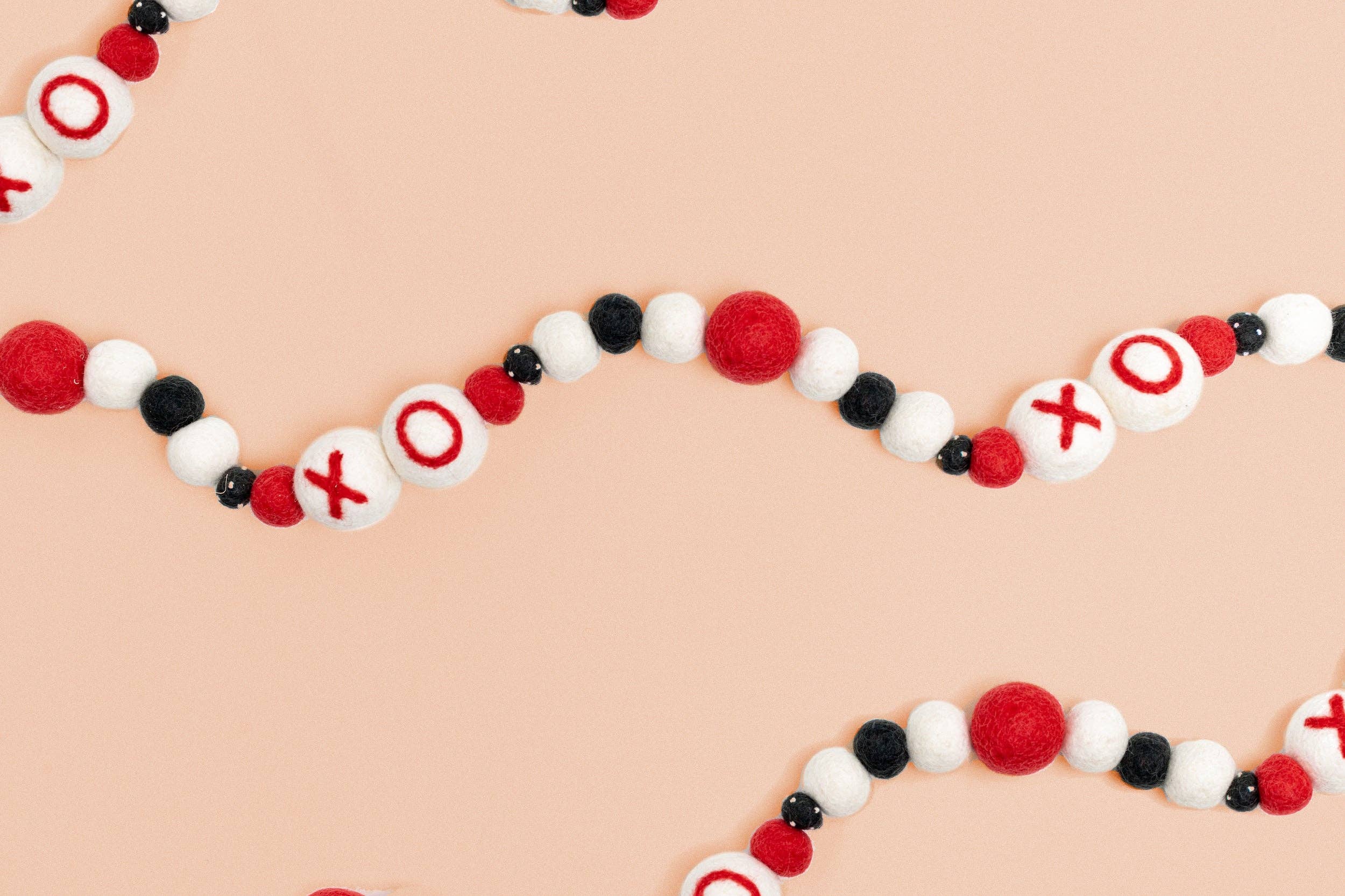 Global Goods Partners – Großhandel Wimpel/Girlande – Filz XO Garland1