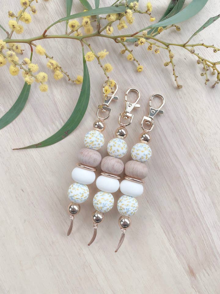 Golden Floral Keychain for wholesale by Chuckle & Wood