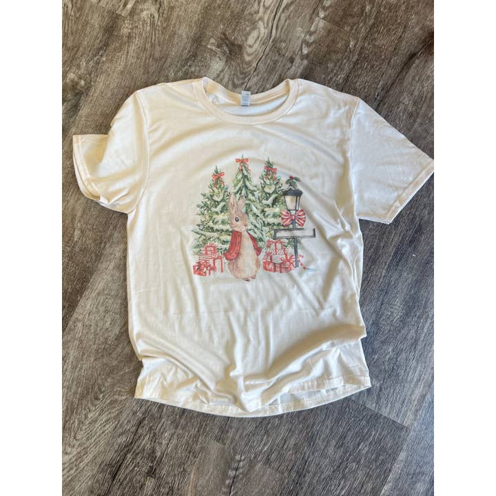 Christmas Bunny with Trees and Presents on Cream Tee for wholesale by RMN Wholesale