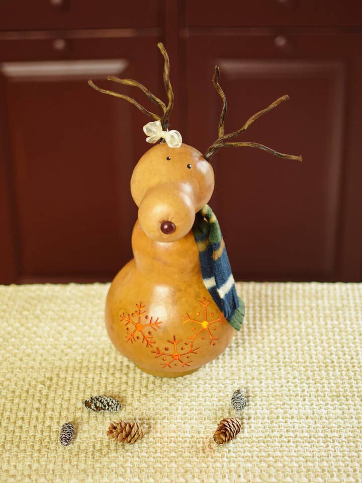 Dash Reindeer Girl Hand-Crafted Gourd Luminary for wholesale by Meadowbrooke Gourds