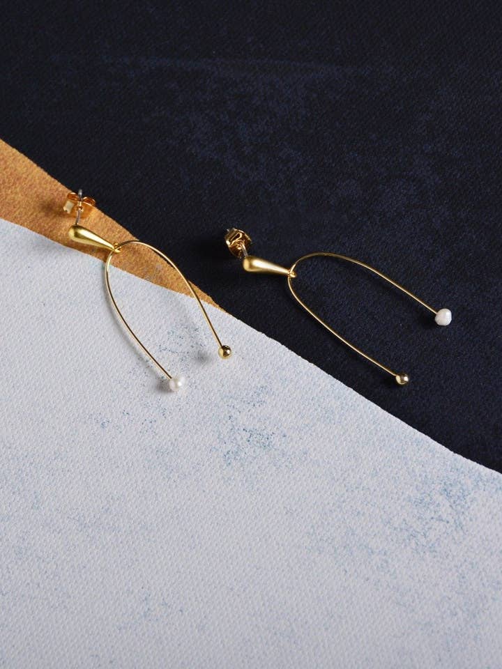 Pendientes de gancho en U con perla y oro para venta al por mayor de Marco Visconti