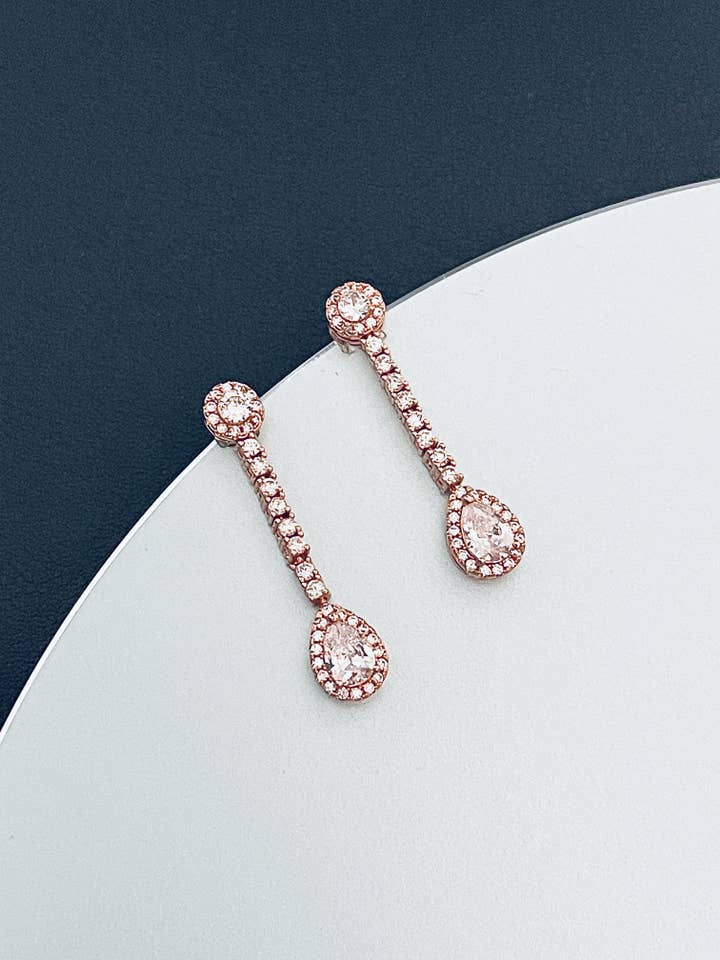 ALEXANDRA - Multi-Shaped Delicate Teardrop Crystal Drop Earrings In Rose Gold for wholesale by JohnnyB Jewelry