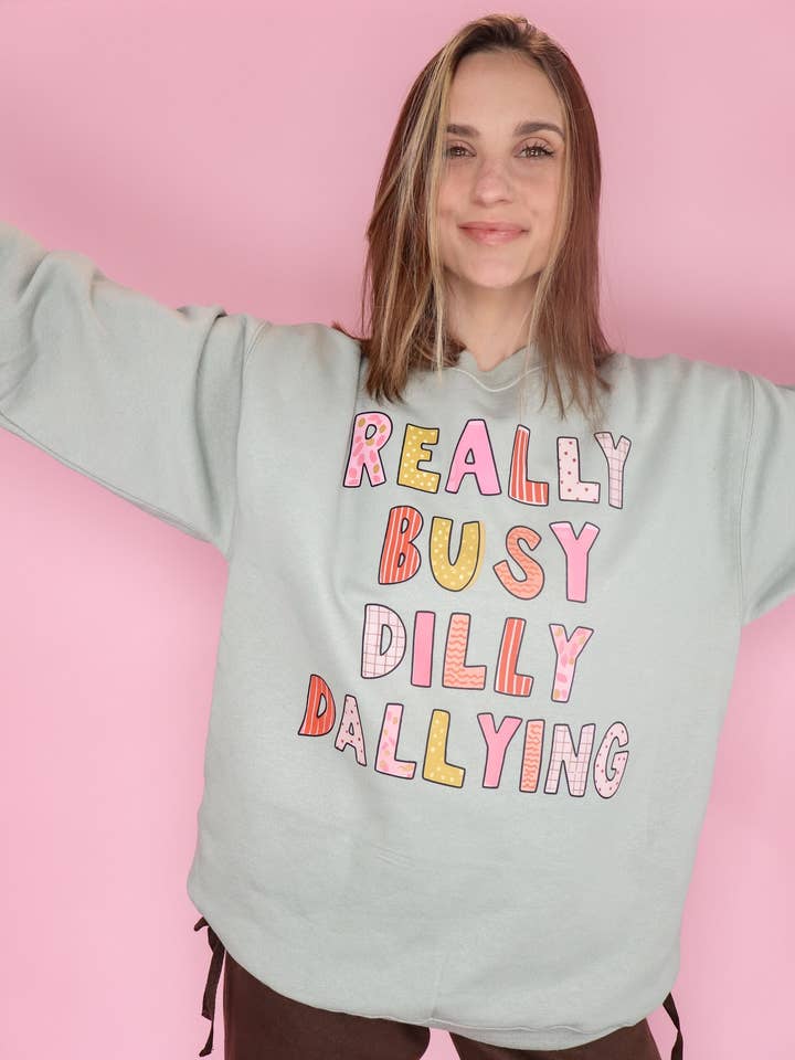 Really Busy Dilly Dallying Sweatshirt, Funny Women Sweatshirt, Cozy Mother's Day Gift, Unisex Graphic Crewneck, Relaxed Fit Pullover for wholesale by Little Mama Made It