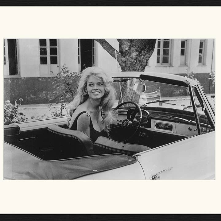 Black Brigitte Bardot Al Volante. Wall art print with frame. for wholesale on Faire12