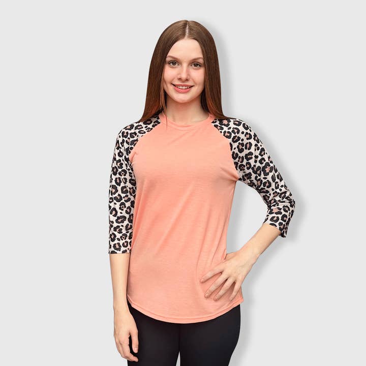 Cheetah Coral Polyester Top for wholesale by ILTEX Apparel