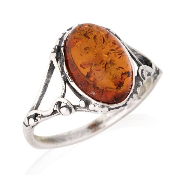 Oval ring i cognac rav fra Østersøen med 925 forgyldt sølv for engroshandel hos OPALOOK France