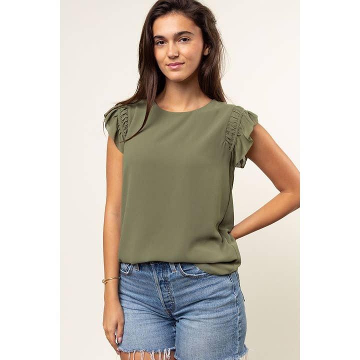 Top mit Rüschen an den Schultern und Schalenärmeln für den Großhandel von Naked Zebra Rack