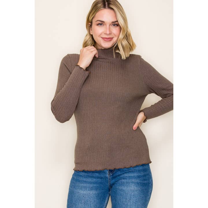 HAUT CÔTELÉ LOURD À OURLET MERROWÉ pour la vente par STACCATO