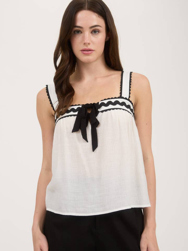 Blu Pepper – wholesale Blouse – Women’s – SLEEVELESS WAVY TRIM FRONT SPLIT WITH TIE BLOUSE