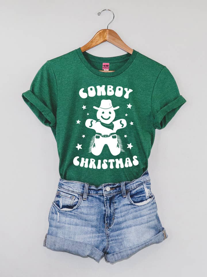 Cowboy Christmas Graphic Tee - Heather Grass Green for wholesale by Ali Dee