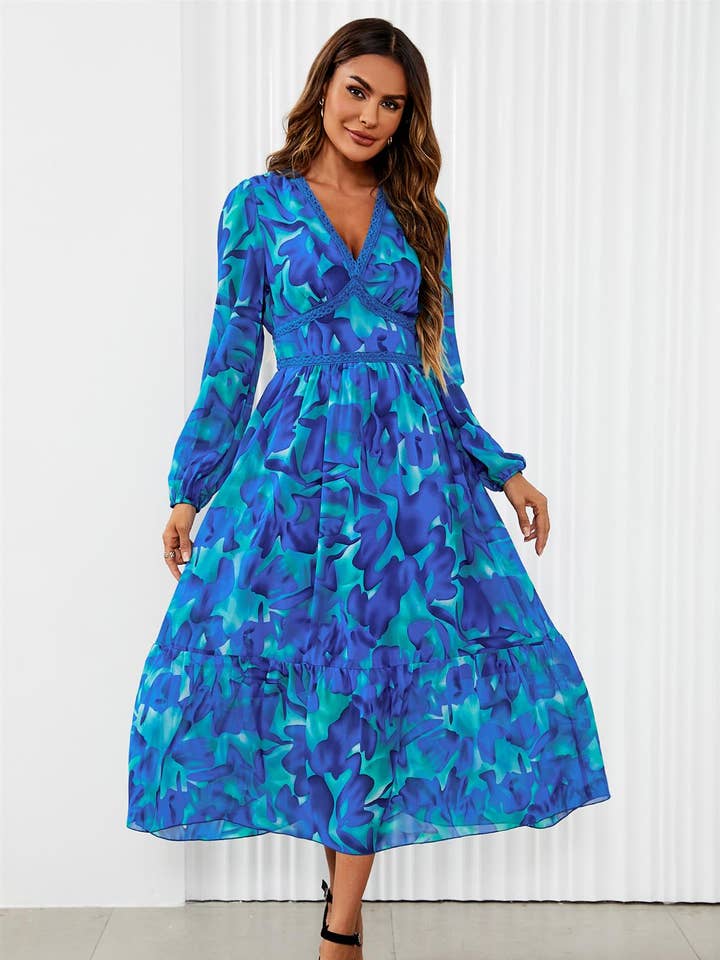 Robe longue à manches longues à imprimé floral en bleu pour la vente par FS Collection