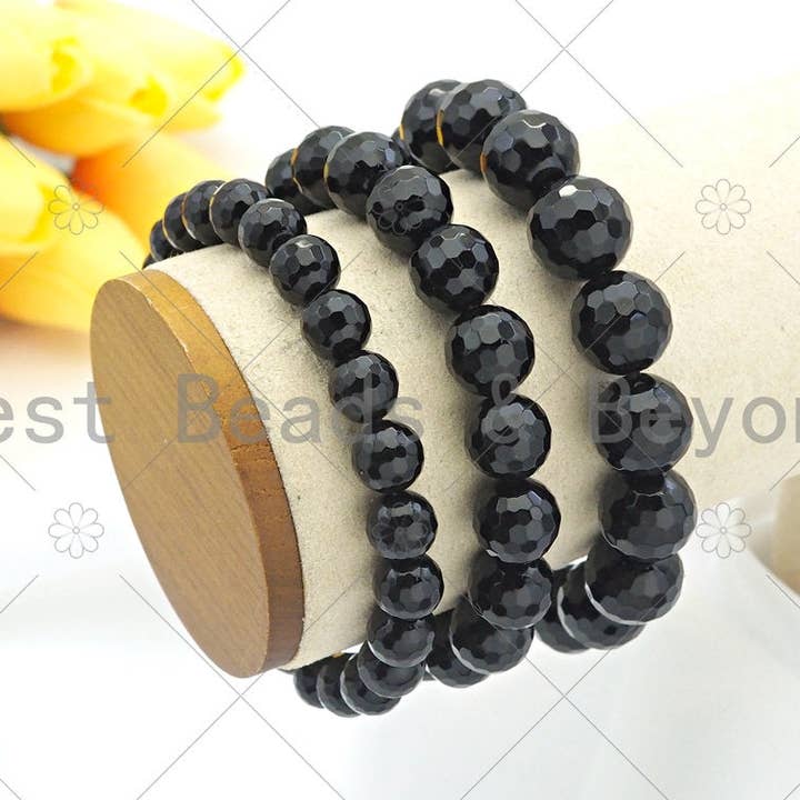 Bracciale elastico sfaccettato rotondo in onice nera, Sku #EF04 per la vendita all'ingrosso da parte di BestBeads&Beyond