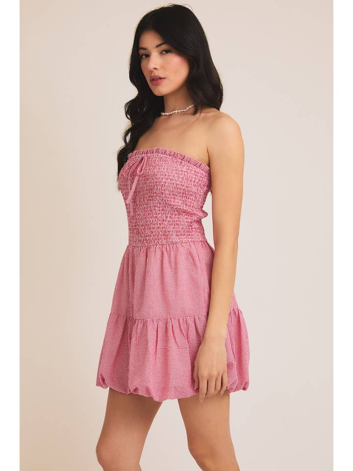 RED WHITE GINGHAM STRAPLESS SMOCKED TOP BUBBLE HEM ROMPER for wholesale on Faire