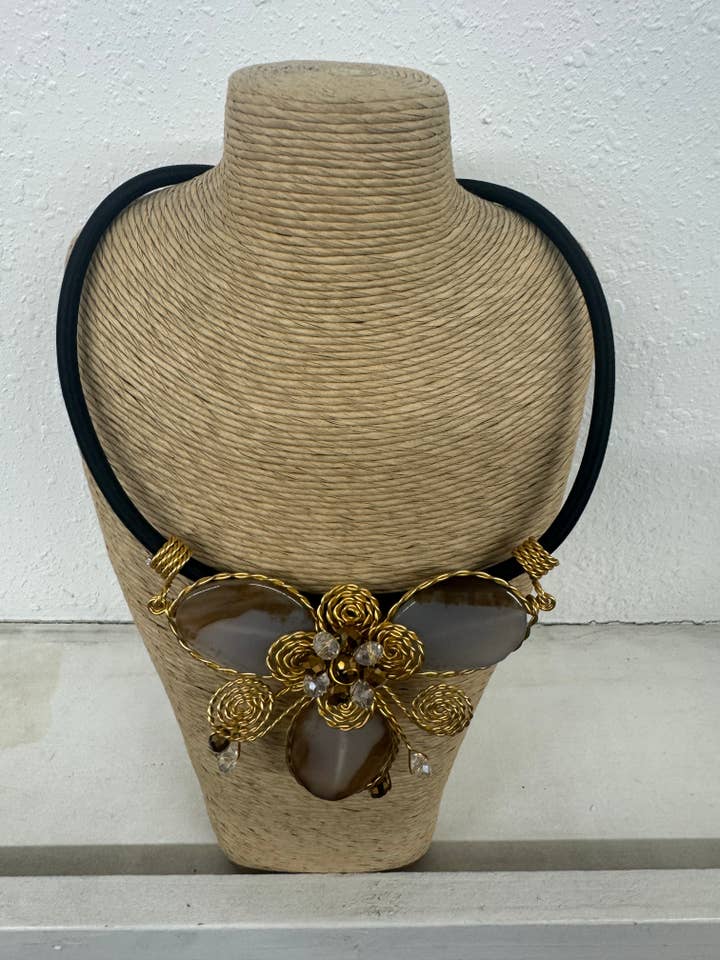 BLACK CORD WITH THREE SEMI PRECIOUS STONE WITH GOLD FLOWER D for wholesale by International Duru's