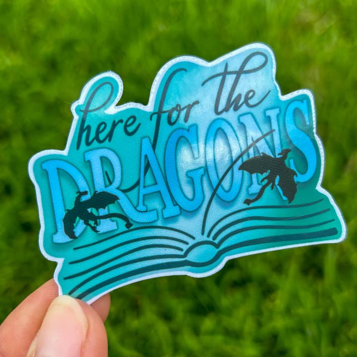 The Here for the Dragons Sticker for wholesale by Paperback Post