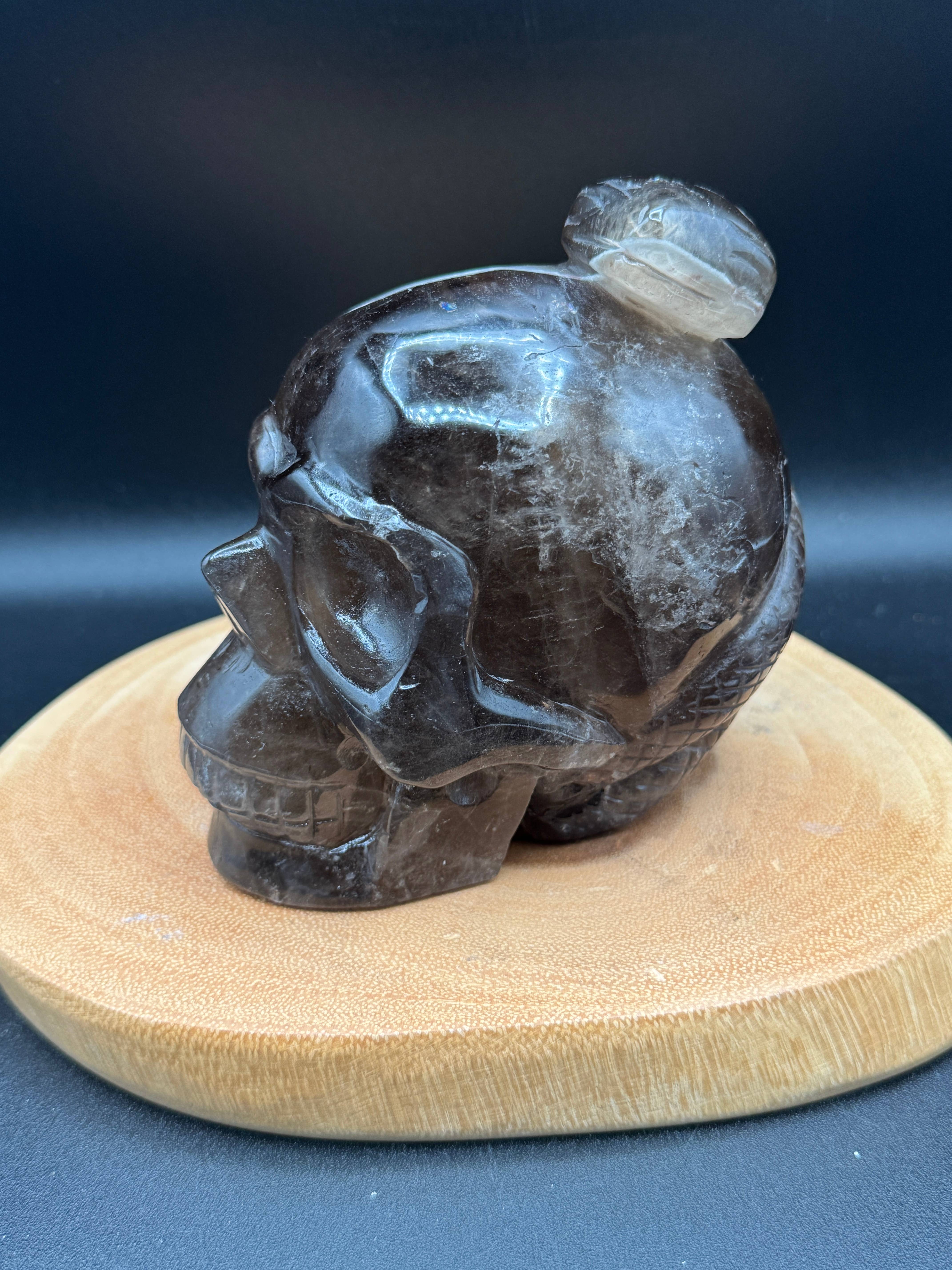 The 7 Directions - Wholesale Spiritual Stone/Crystal - 3.9 lb Unique Smoky skull w/ snake carving H369