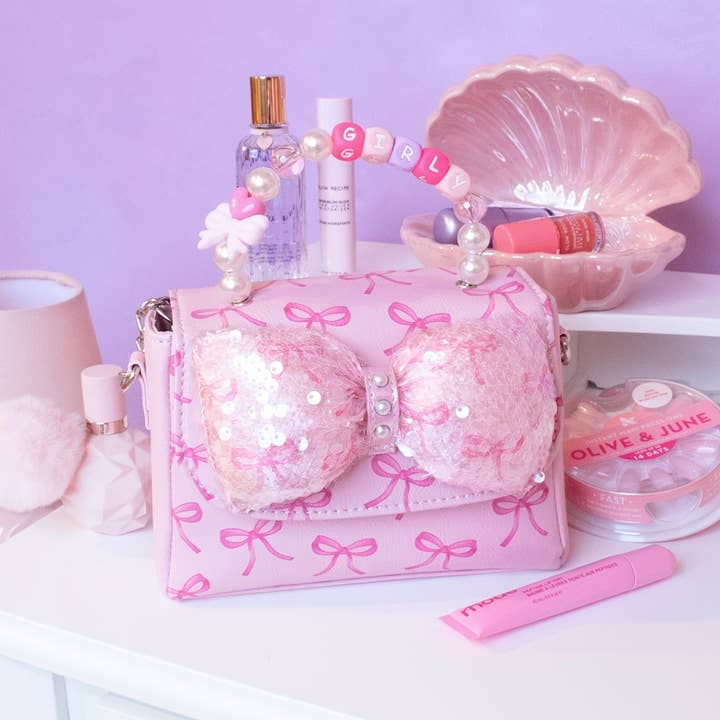 Mini-Umhängetasche mit Pailletten-Schleife, Druck und Perlenhenkel für den Großhandel von OMG Accessories