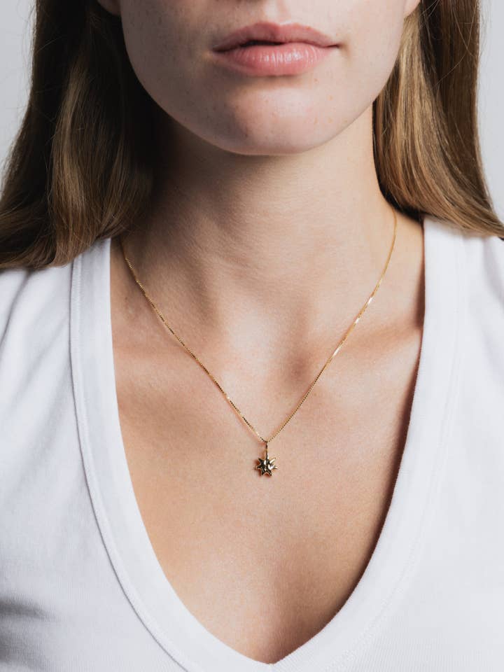 Sun Charm Necklace in Gold for wholesale by Wolf Circus Jewelry