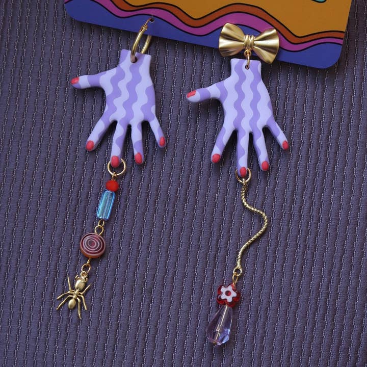 Wavy Purple Hand Earrings for wholesale by Sunny and Sal