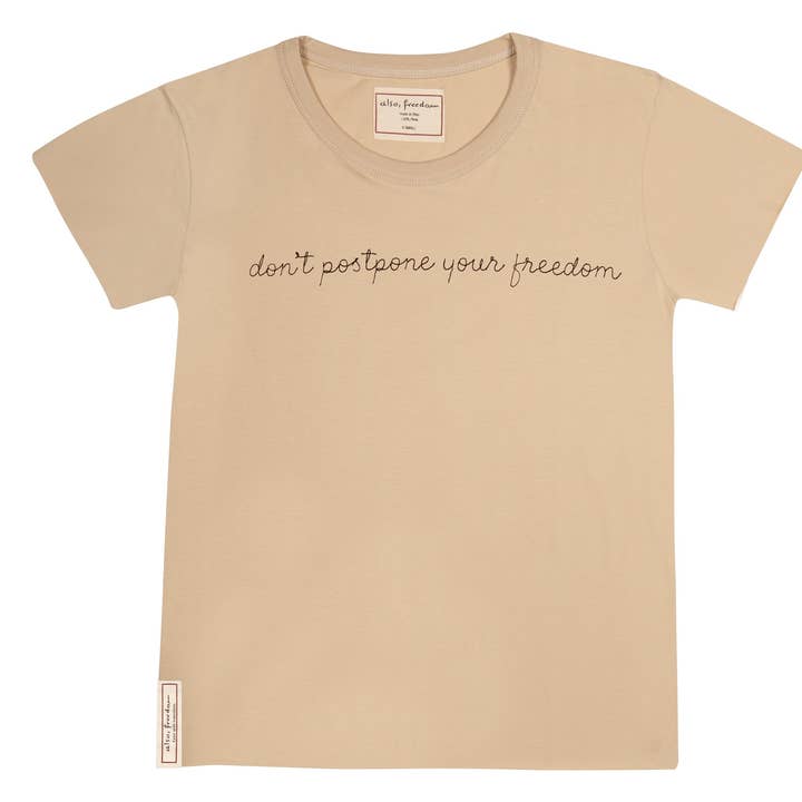 T-shirt Don't Postpone Your Freedom, per bambina, colore: beige con parte anteriore per la vendita all'ingrosso da parte di Also, Freedom