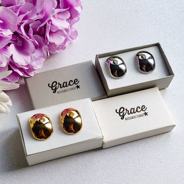 DANIELLE ~ Par ovale knapøreringe - RUSTFRIT STÅL for engroshandel hos Daemon srls