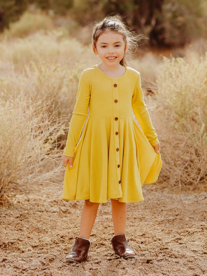 Ribbed Twirl Dress | Mustard for wholesale by Eliza Cate and Co