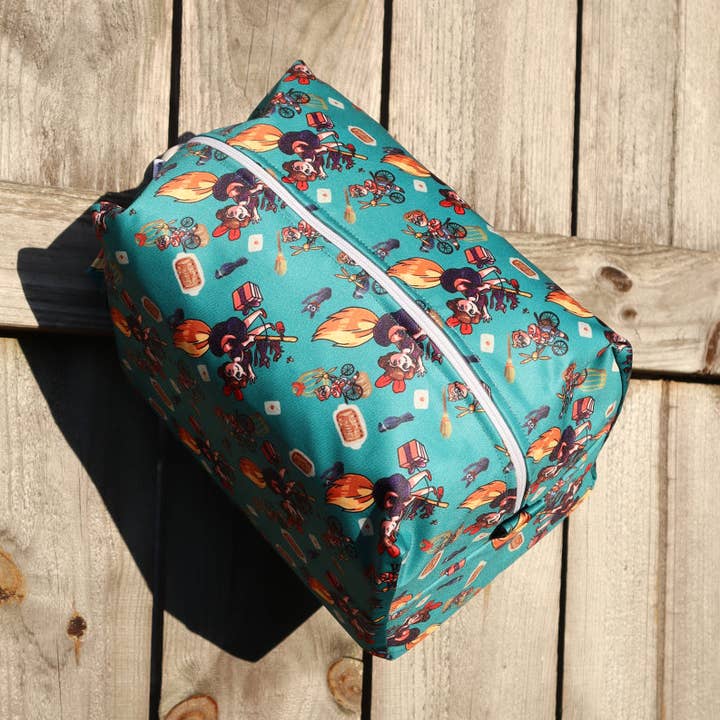 BROOMSTICKS & BAKED GOODS TRAVEL POUCH for wholesale by River City Bags