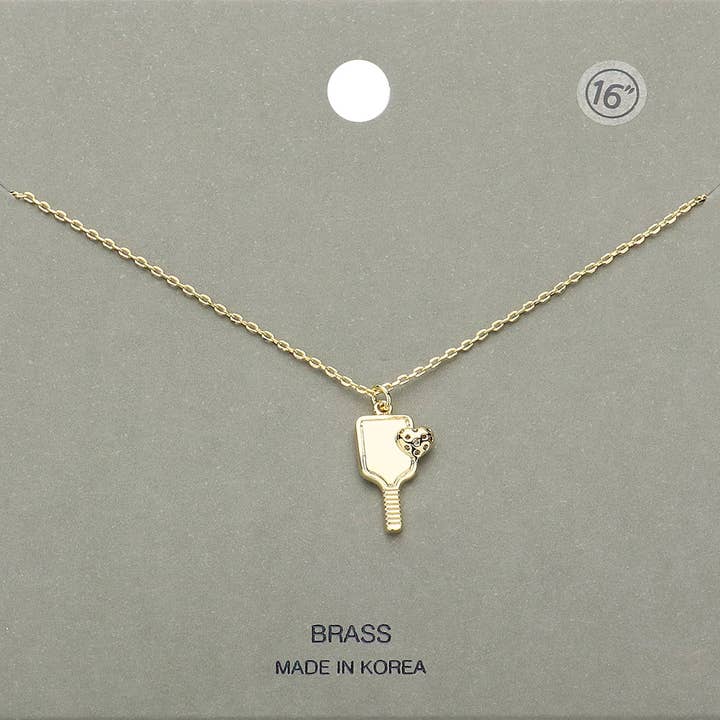 Collier à pendentif en forme de cœur en forme de pagaie de pickleball en métal pour la vente par Sensibling Corp.