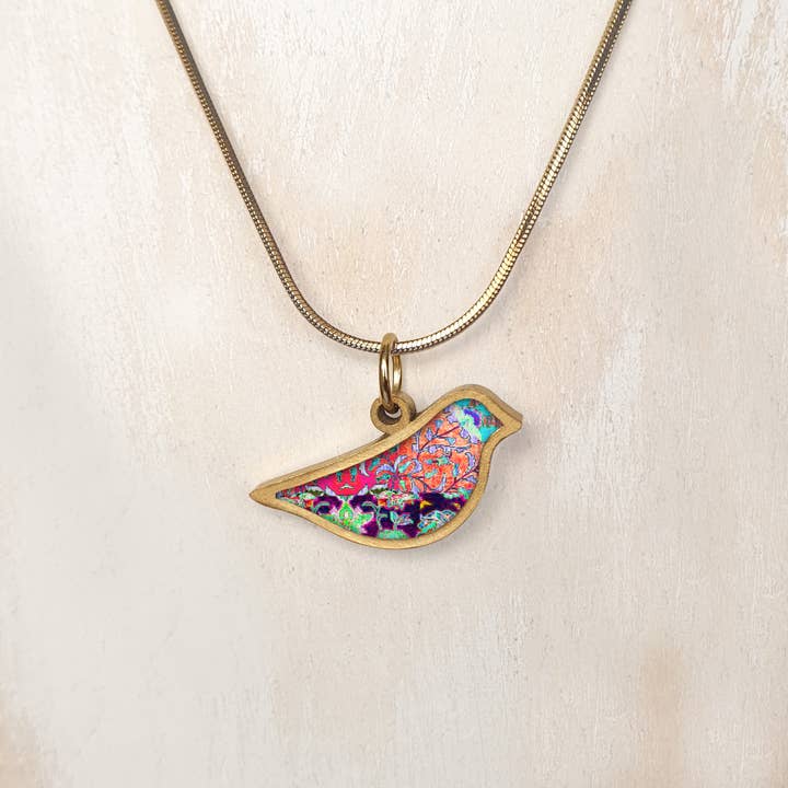 Bird pendant with a decorated ceramic - Gold for wholesale by Noa Jewellery