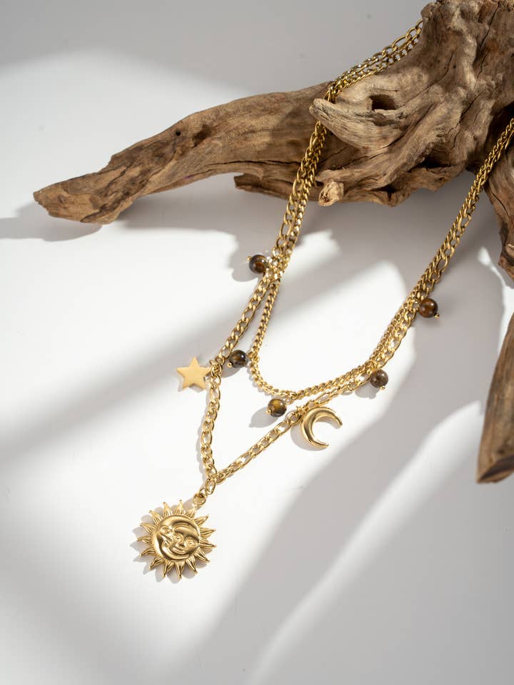 Gold multi-charm necklace sun moon star tiger's eye for wholesale by COSMOS
