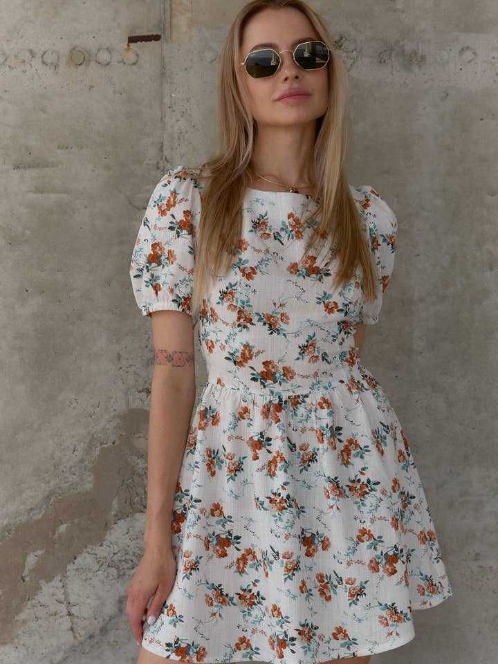 Milk dress with open back and weave for wholesale by Azuri Fashion Group