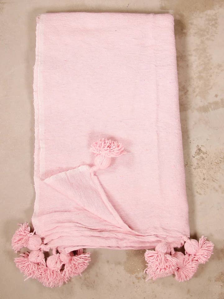 Manta marroquina rosa com pompons e franjas para quarto por atacado de Mikwi
