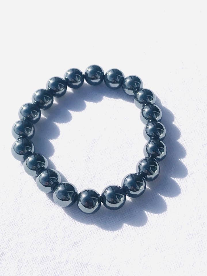 Hematite 10mm Round Tumbled Stone Bracelets for wholesale by Crystal Universe