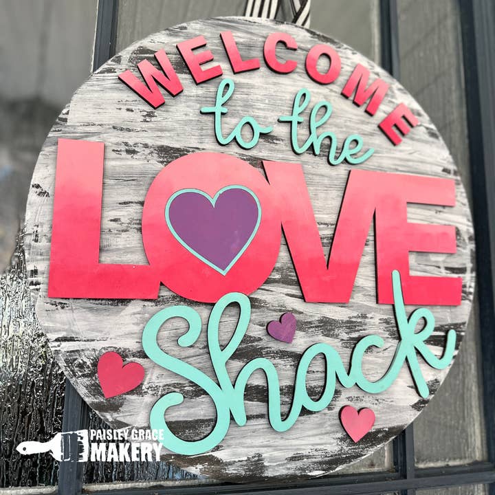 Welcome To The Love Shack Door Hanger P03513 for wholesale by Paisley Grace Makery