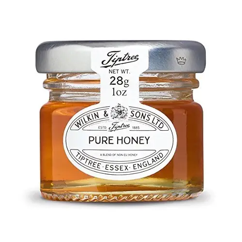 The Black Butterfly – wholesale Honey – Tiptree honey with dipper in white organza bag1