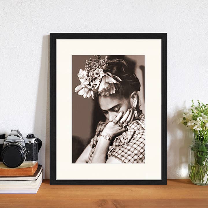 Black Frida Kahlo image. Wall art print with frame. for wholesale on Faire