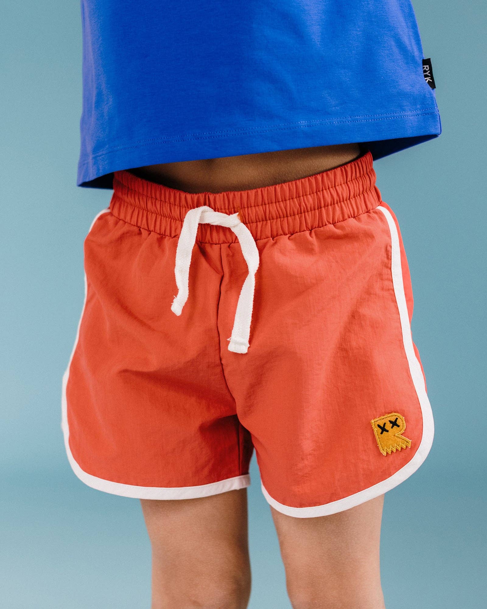 RETRO JOGGER SHORTS IN RED for wholesale on Faire