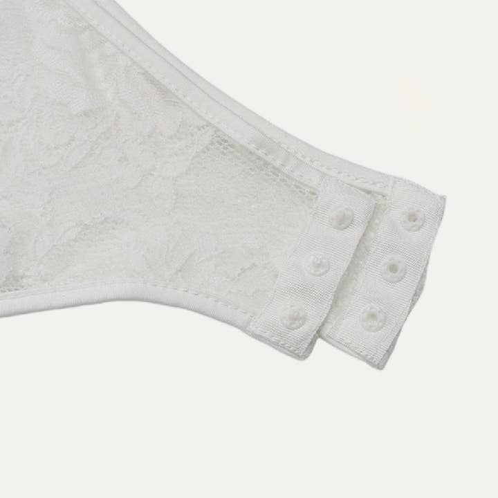 Branco Bodysuit sexy de renda transparente branco com cílios e gola com gola e gola sem mangas para venda a revendedores na Faire4