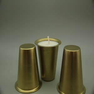 Purchase Wholesale taper candle molds. Free Returns & Net 60 Terms on Faire