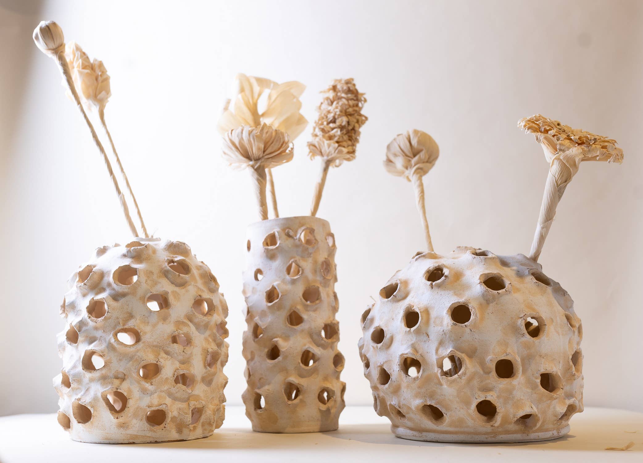 Lg Cylinder Object with holes White Ivory 5.5"X5.5"X11.75" for wholesale on Faire1