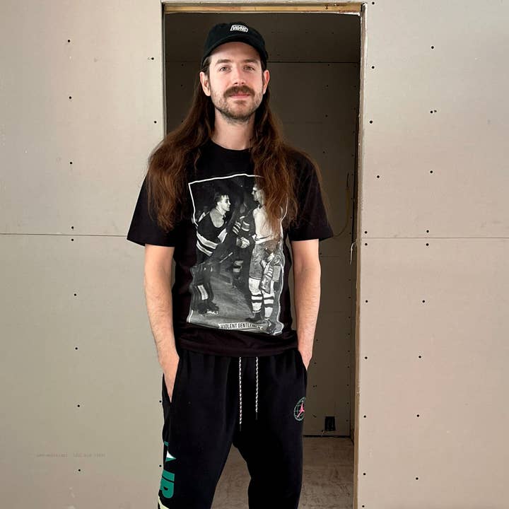 Black Handshake Premium Tee for wholesale on Faire2