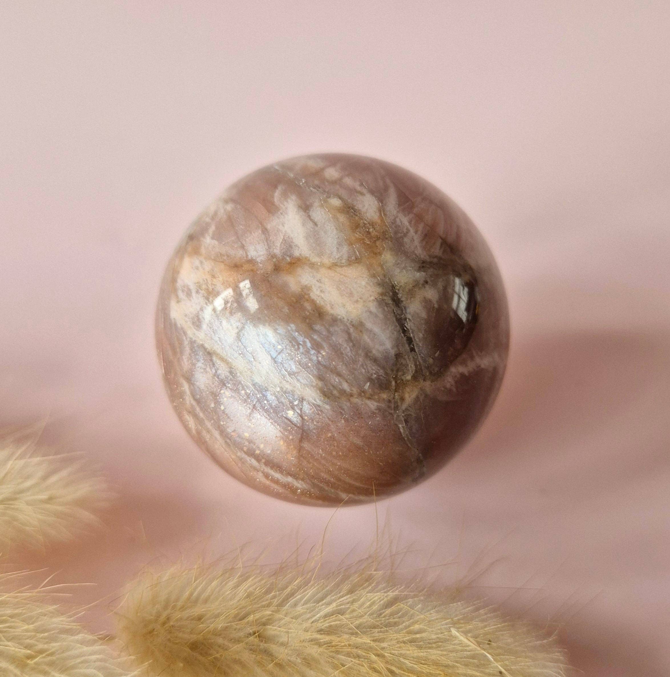 Moonlight Gemstones - Wholesale Spiritual Stone/Crystal - Crystal Gemstone Golden Sunstone Sphere with Blue & Gold Flash | 45–63 mm sphere1