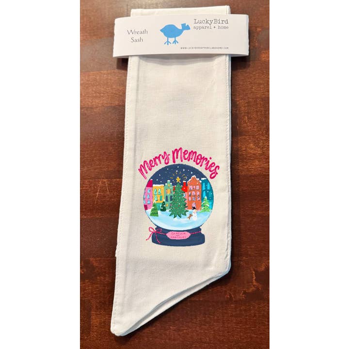 EMMALEE SNOWGLOBE MERRY MEMORIES WREATH SASH for wholesale by LuckyBird Apparel and Home