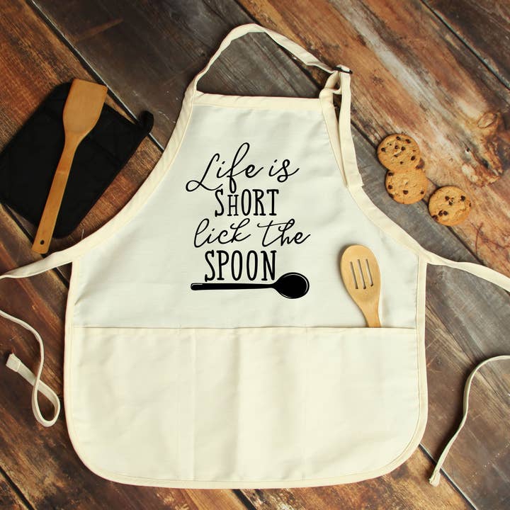Livet är kort, slicka skeden förkläde för wholesale av Potter's Printing