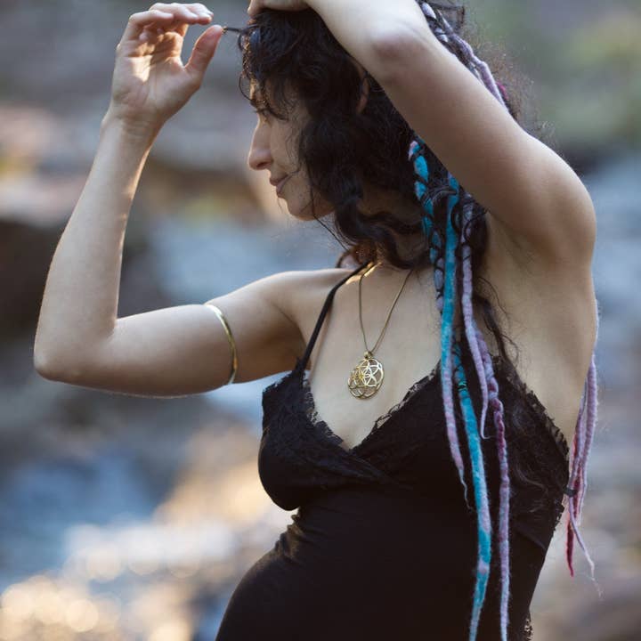 Brass 3D Seed of Life Pendant for wholesale on Faire4