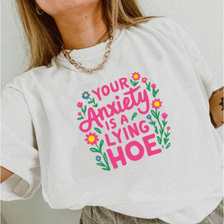 Your Anxiety Is A Lying Hoe T-Shirt or Crew Sweatshirt for wholesale by Peach Closet